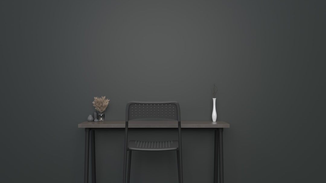 Minimalist editorial office with large window and wooden shelving